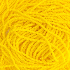 13/0 Charlotte Cut Preciosa (Czech) Bead Opaque Lemon Yellow Strung