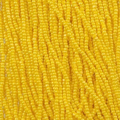 11/0 Charlotte Cut Preciosa Bead Opaque Yellow Luster Strung