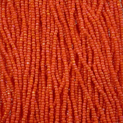 11/0 Charlotte Cut Preciosa Beads Opaque Orange Rainbow Strung