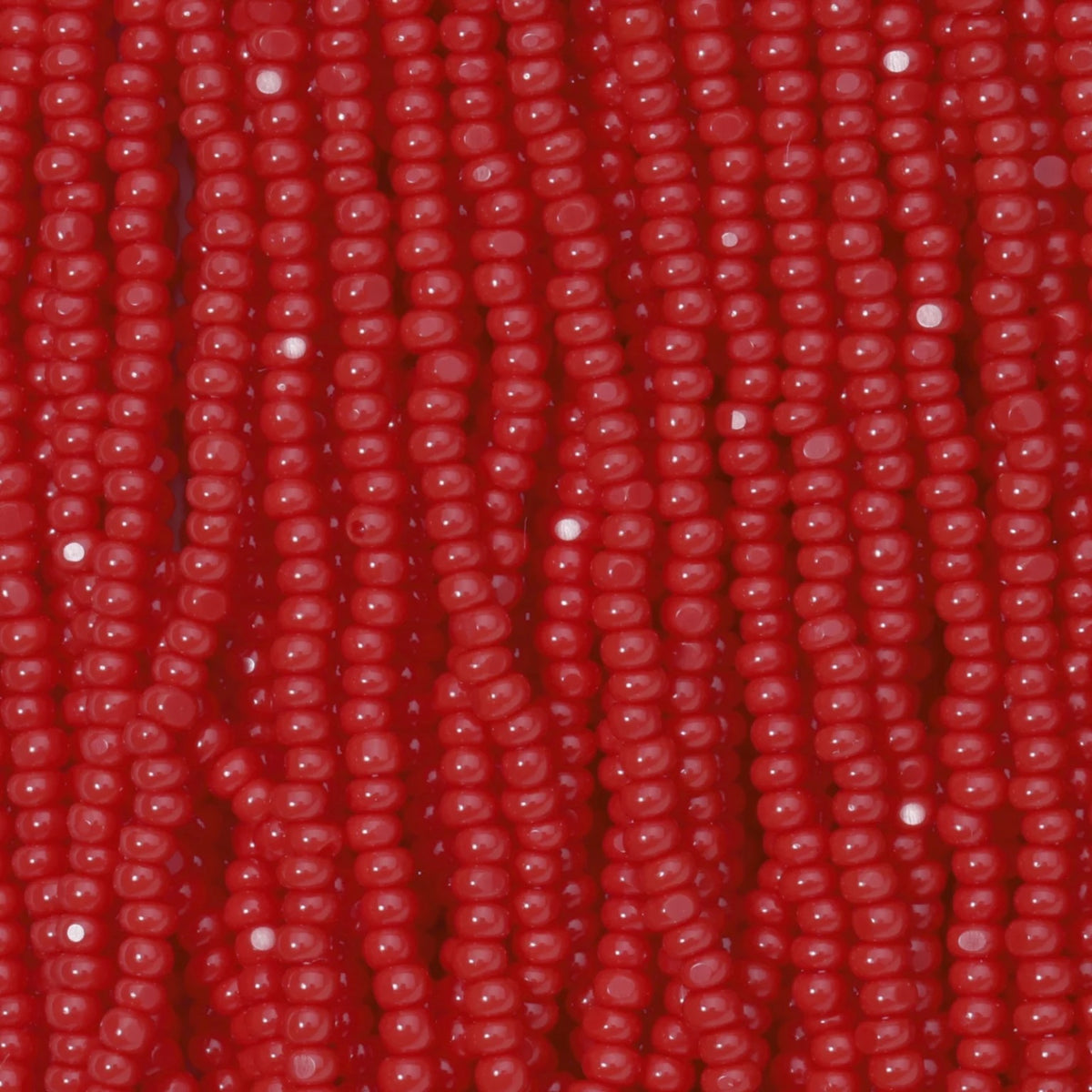 13/0 Charlotte Cut Preciosa (Czech) Bead Opaque Red Strung