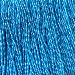 13/0 Charlotte Cut Preciosa (Czech) Bead Opaque Light Blue AB Strung