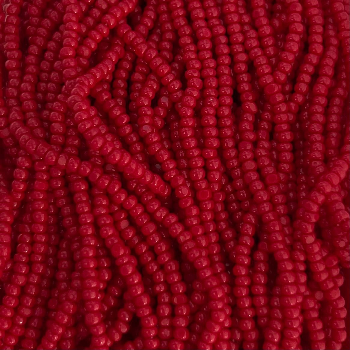 11/0 Charlotte Cut Preciosa (Czech) Bead Opaque Medium Dark Red Strung